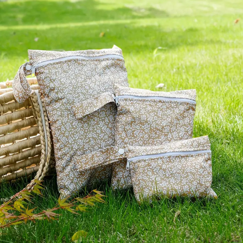 3-osaline veekindlate kottide komplekt lillemustriga